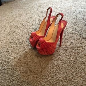 Christian Louboutin Suede Platform Pumps in Coral